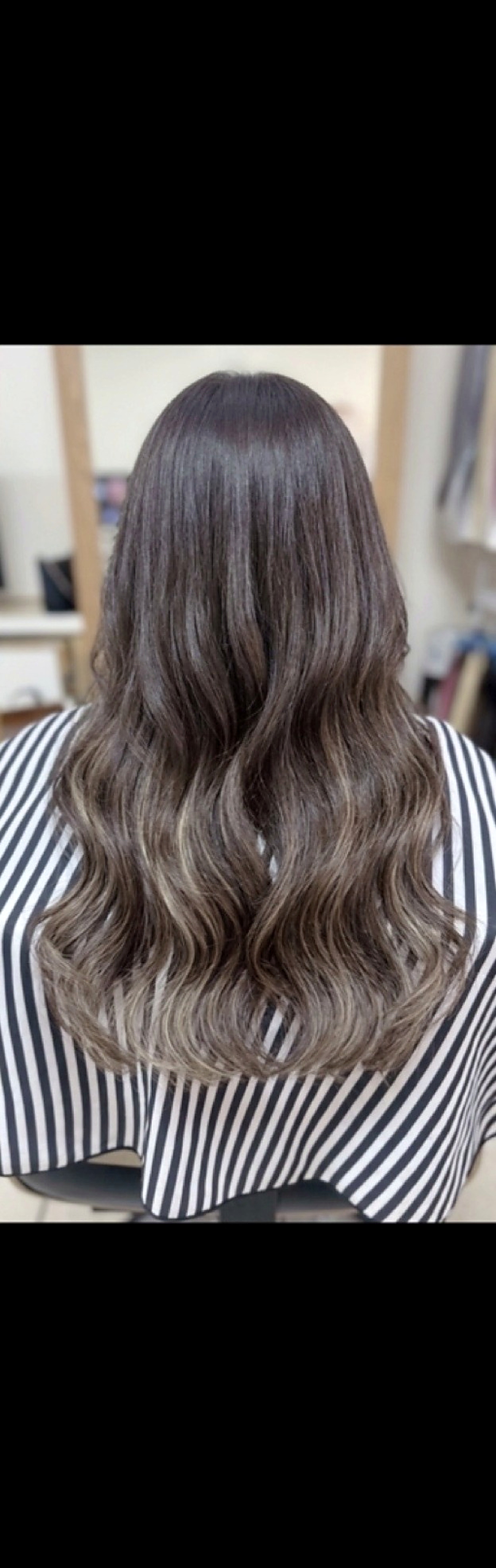 After: long, full, hand-braided extensions with natural wave at Dass Hair Salon, Carrollton, Texas